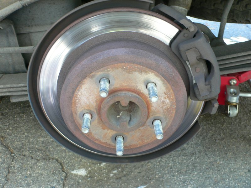 Remove Caliper Mounting Bolts Remove Caliper Mounting Bolts