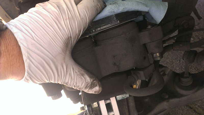 Install Pad in Caliper