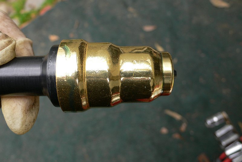 Place new injector cup on tool